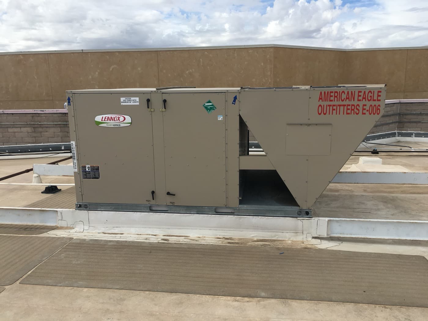 Lennox commercial rooftop HVAC unit on commercial building