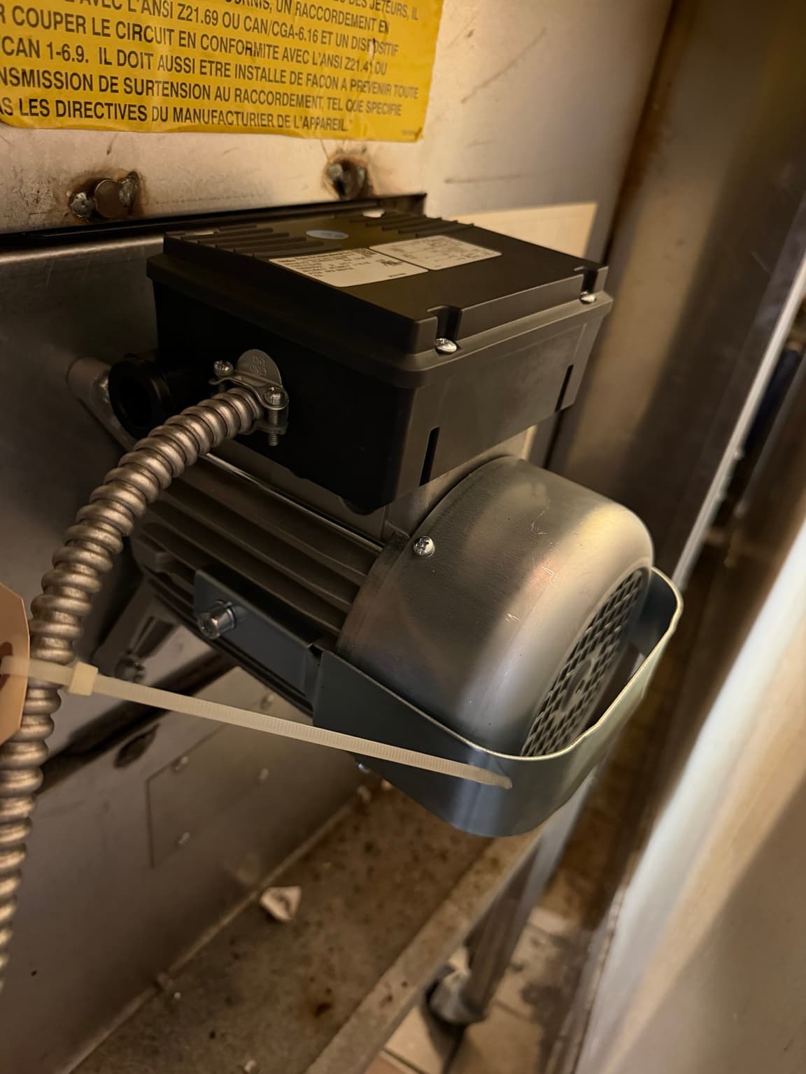 Garland convection oven motor assembly documented during service in Manhattan